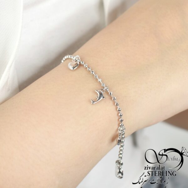 دستبند زنانه برند ژوپینگ با مهره دلفین و قلب کد:۲۹۲۱