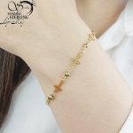 دستبند صلیب طلایی برند استیل کد 10886