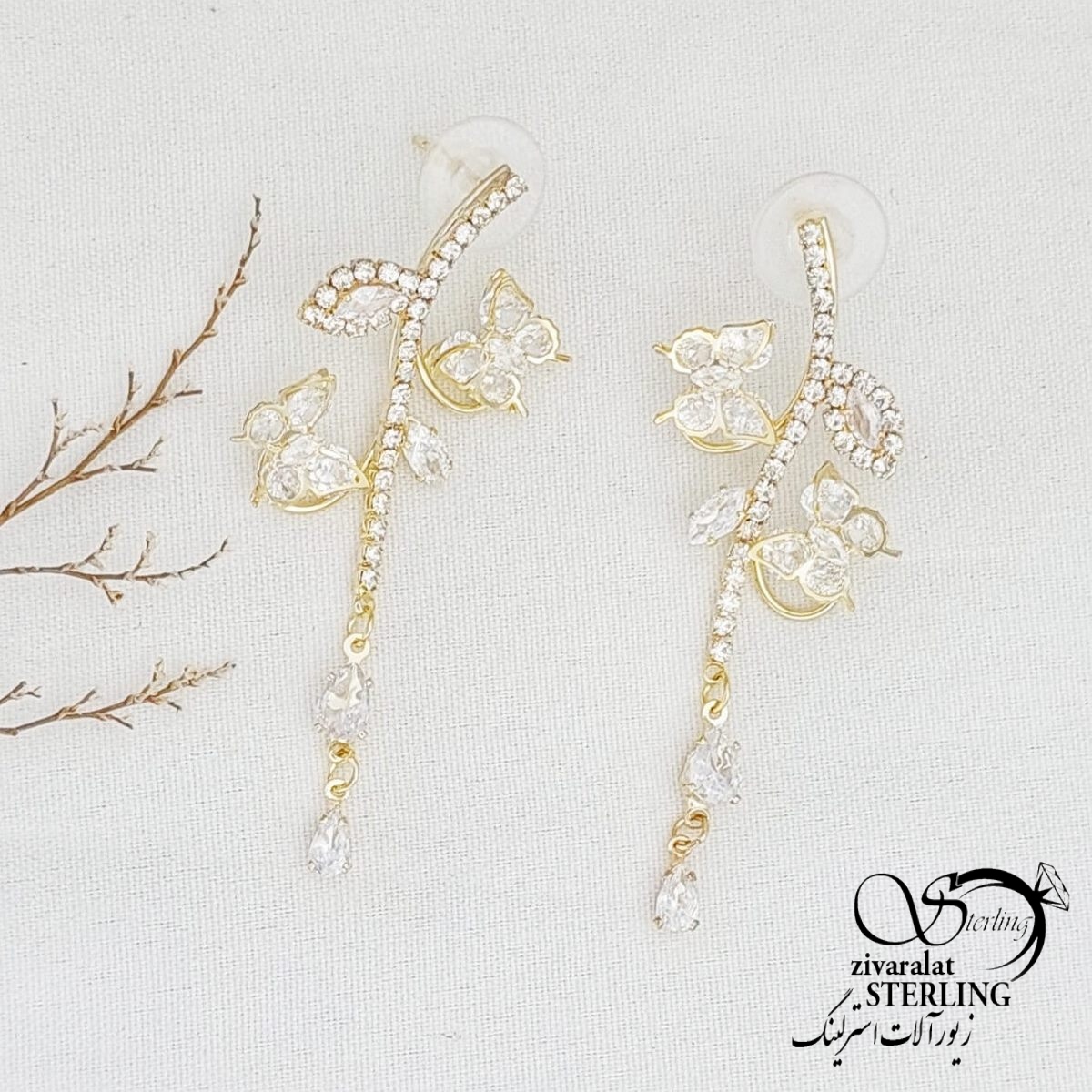 گوشواره پروانه طرح طلا(جواهری) کد 12188 گوشواره پروانه طرح طلا(جواهری) کد 12188