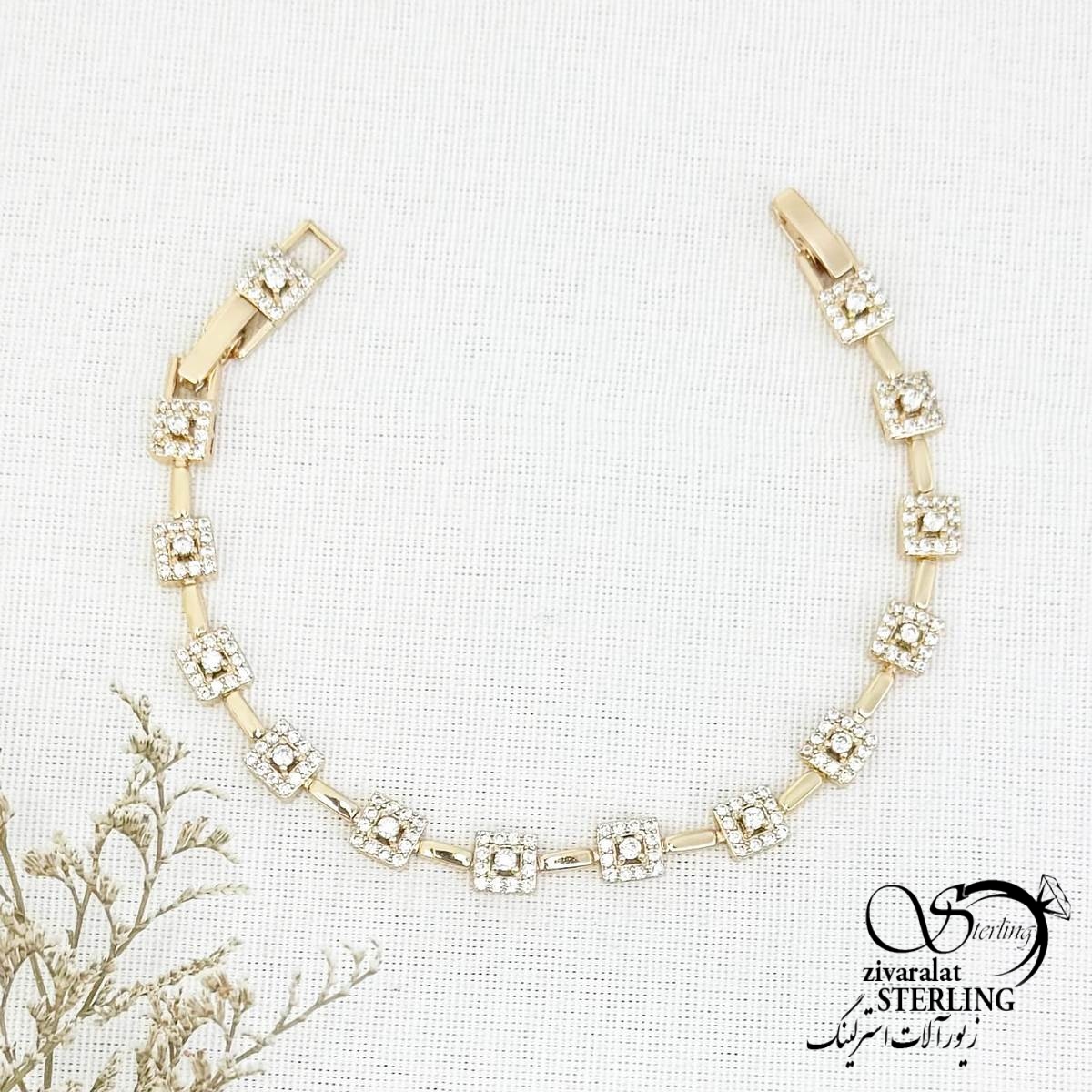 دستبند ژوپینگ نگین مربعی طرح طلا کد 14443 دستبند ژوپینگ نگین مربعی طرح طلا کد 14443