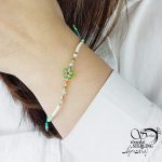 دستبند آسانسوری گل دار با مهره سبز کد 16507