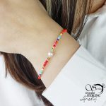 دستبند آسانسوری صورتی با مهره رنگی کد 16509