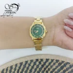 ساعت بند طلایی و صفحه سبز برند استیل کد 19951