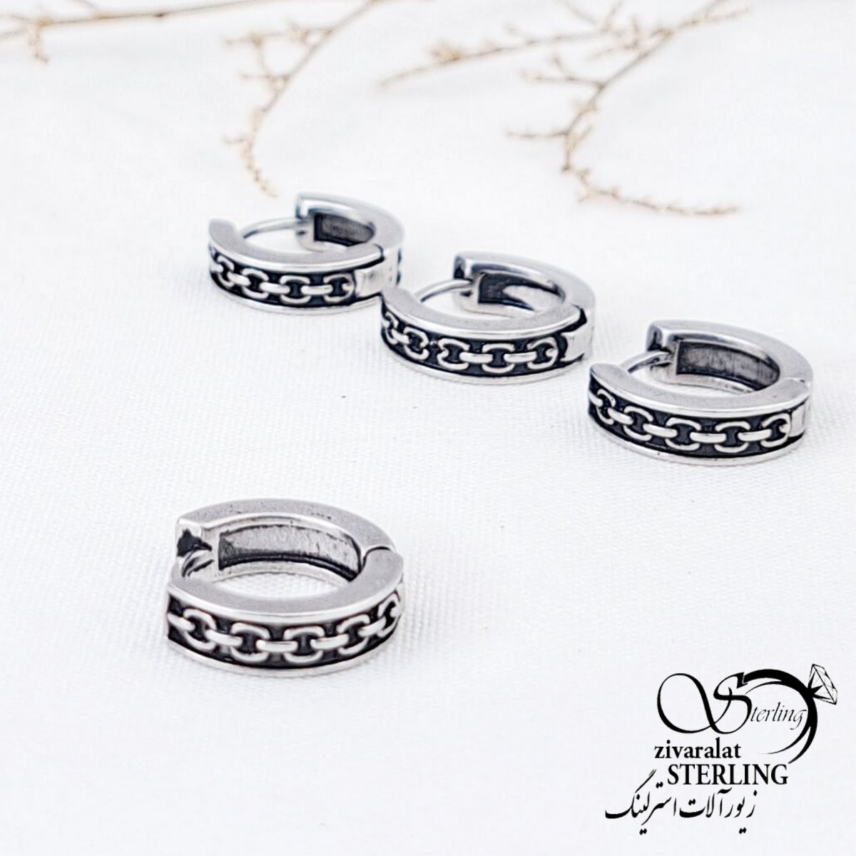 12297-160-4d8aad8a7-copy.jpg پیرسینگ گوش استیل طرح زنجیری با کد 12297
