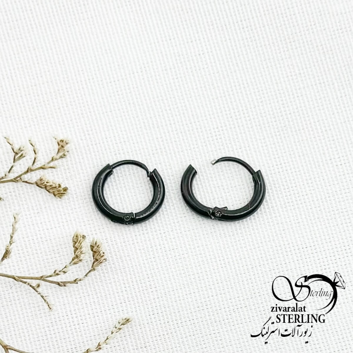 13463-st-55-4d8aad8a7-copy.jpg گوشواره استیل حلقه مشکی سایز کوچیک کد 13463