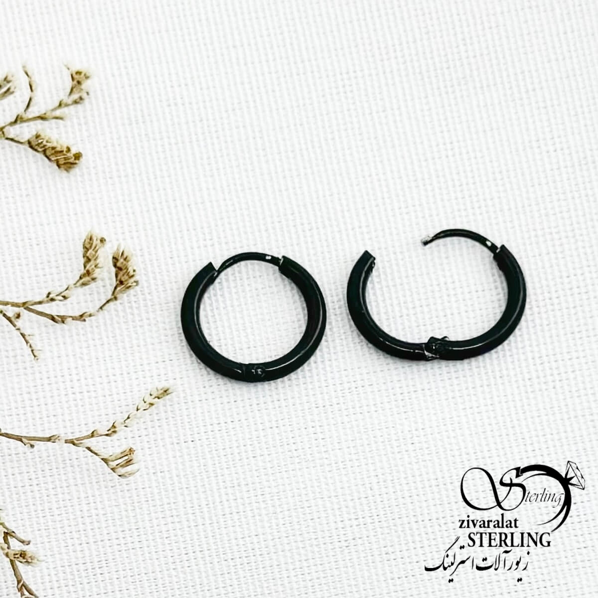 13464-st-55-4d8aad8a7-copy.jpg گوشواره استیل حلقه مشکی سایز متوسط کد 13464