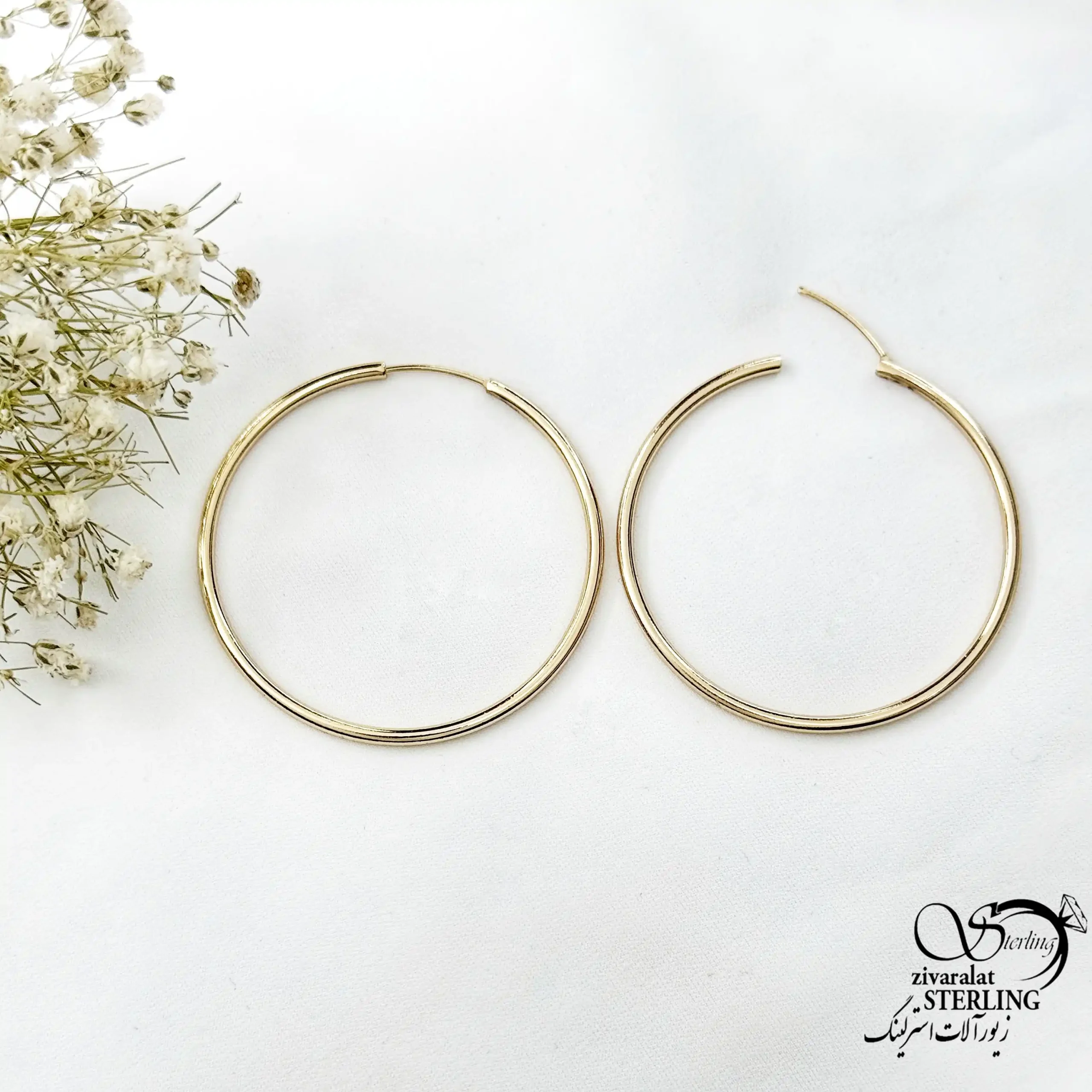 گوشواره حلقه ای طرح طلا برند ژوپینگ سایز 3 کد 21048 گوشواره حلقه ای طرح طلا برند ژوپینگ سایز 3 کد 21048