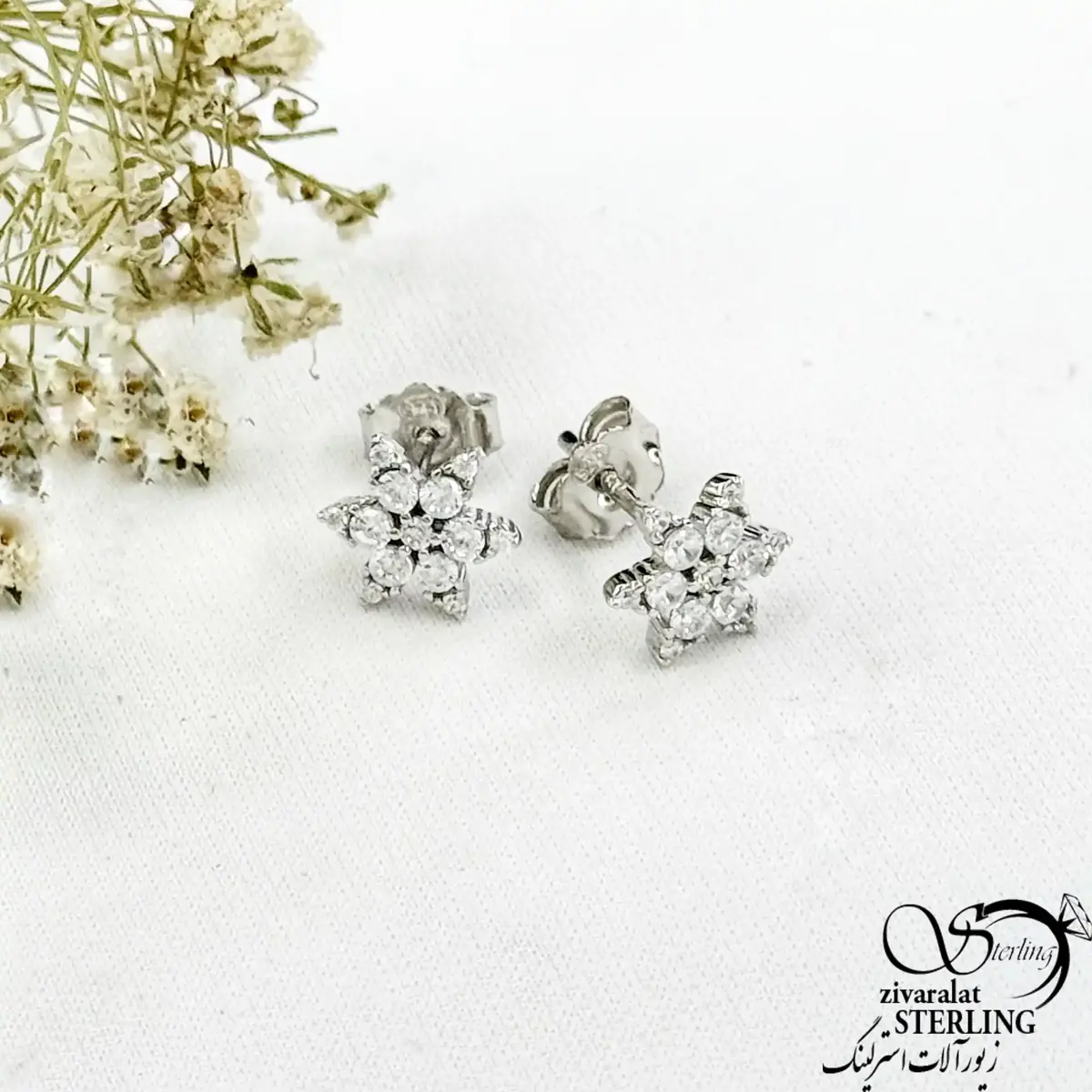 گوشواره میخی نقره طرح گل جواهری کد 21144