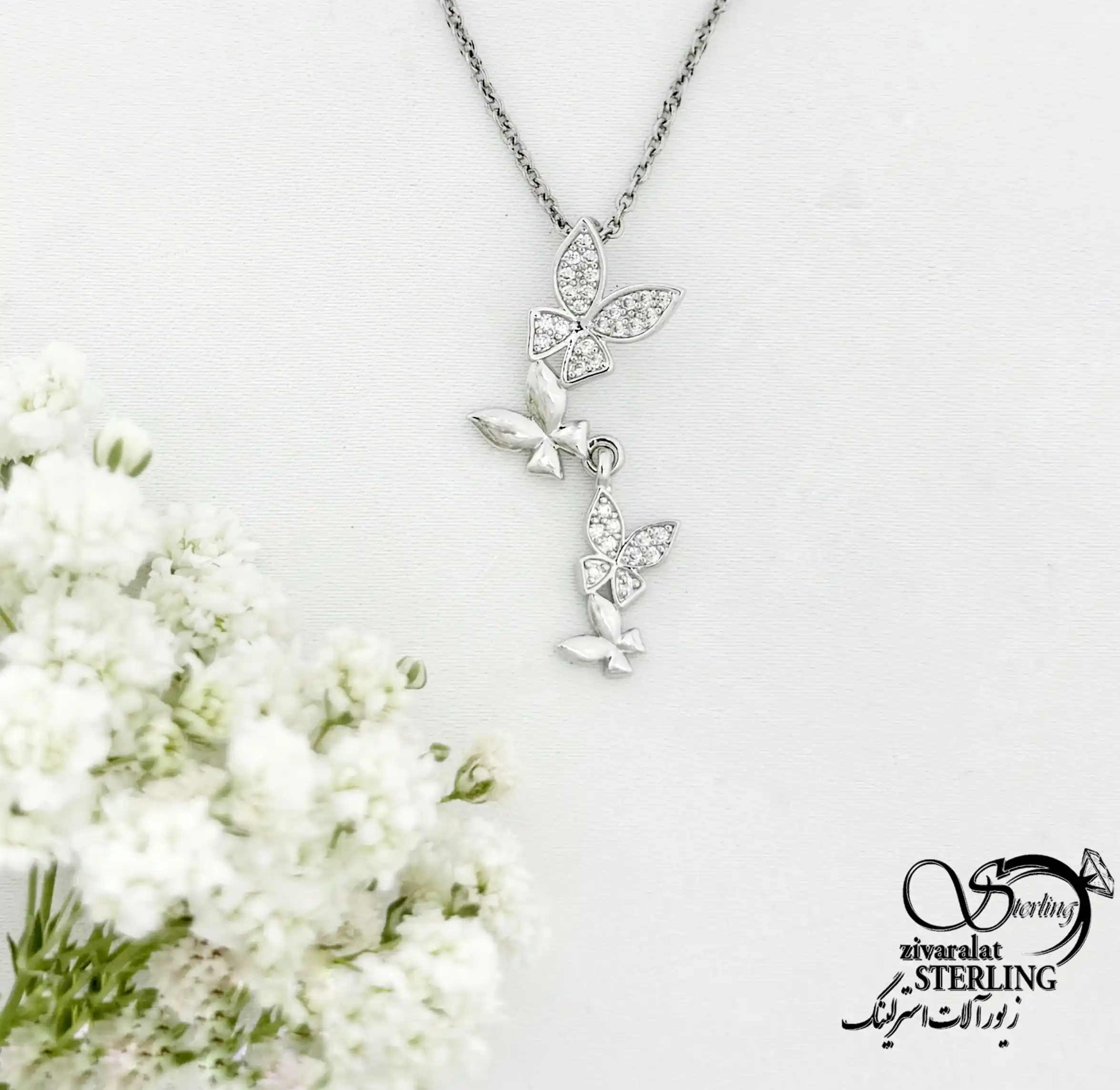 گردنبند پروانه ای نگین دار طرح مدرن کد 22184 گردنبند پروانه ای نگین دار طرح مدرن کد 22184